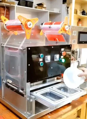 Caja de embalaje desechables máquina de sellado dos Fiambreras en un momento