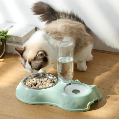  2023 Nuevo portátil barato de plástico mayorista Anti asfixia Pet flotante pequeño perro y gato el agua lenta del alimentador de cuencos de perro alimentadores