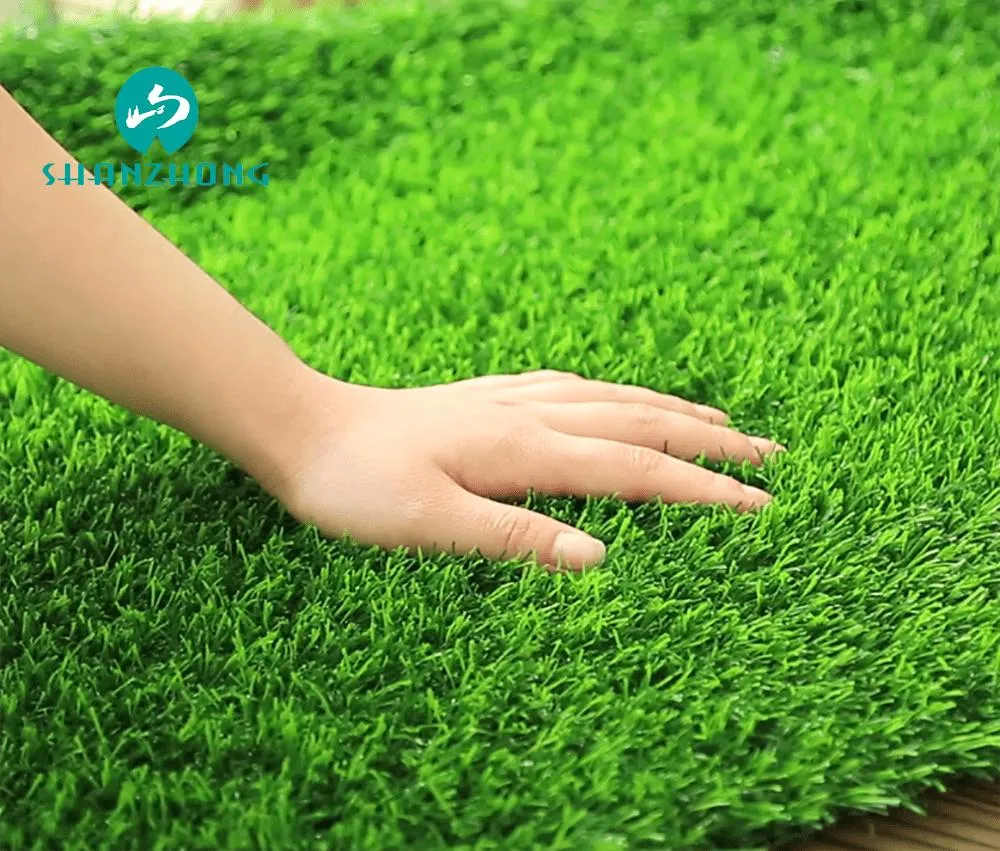 Garden Ornaments Lying on The Real Lawn Synthetic Grass Carpet