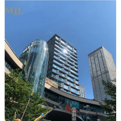 Lusso High-Rise senza giunture facciate in vetro Prezzo Lowe riflettente vetro moderno Sistema a parete