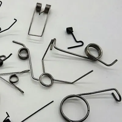 302 Edelstahl-Torsionsfeder, Windrichtung Rechts, 90 Grad Durchbiegung, 0,484 Zoll Ad, 0,054 Zoll Drahtgröße, 2 Zoll Beinlänge, 0,296-Zoll-Mandrel Größe