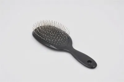 Spazzola ovale per capelli con perno in metallo